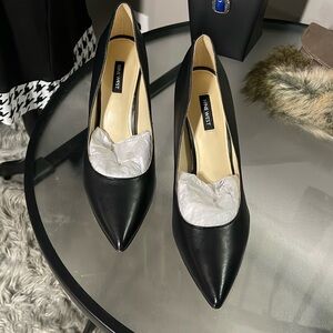 Brand new Nine West pumps. Just a little too snug for me.